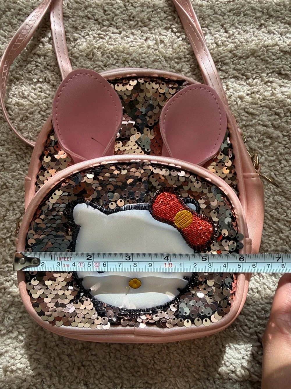 Hello Kitty Pink Sequin Crossbody Bag with Red Bow Accent